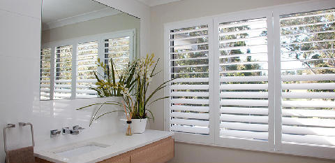 plantation window shutters - work nicely under arched windows